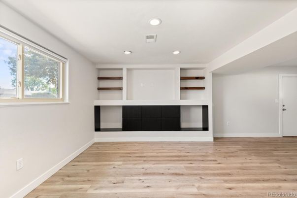 Empty room, Fireplace, Interior, Recessed Lighting, Wood Texture Flooring