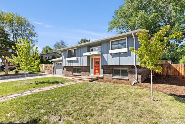 Backyard, Exterior, Facade, Brick Facade, Raised Ranch