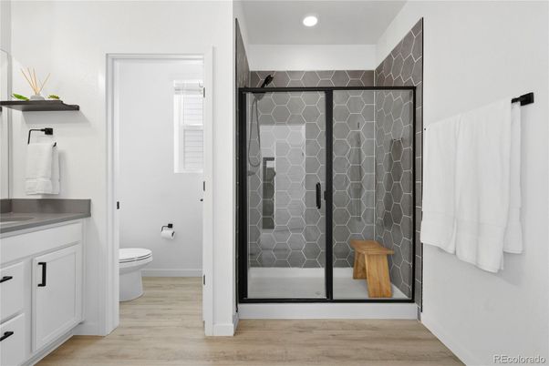 Bathroom, Glass Shower, Interior, Recessed Lighting, Wood Texture Flooring