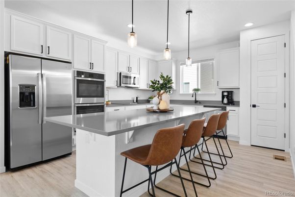 Interior, Kitchen, Pendant Lights, Recessed Lighting, Stainless Steel Appliances, Wood Texture Flooring