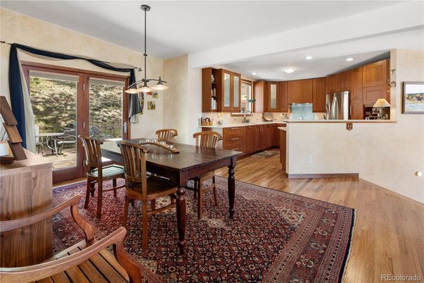 Dining room, Interior, Kitchen, Pendant Lights, Recessed Lighting, Stainless Steel Appliances, Wood Texture Flooring