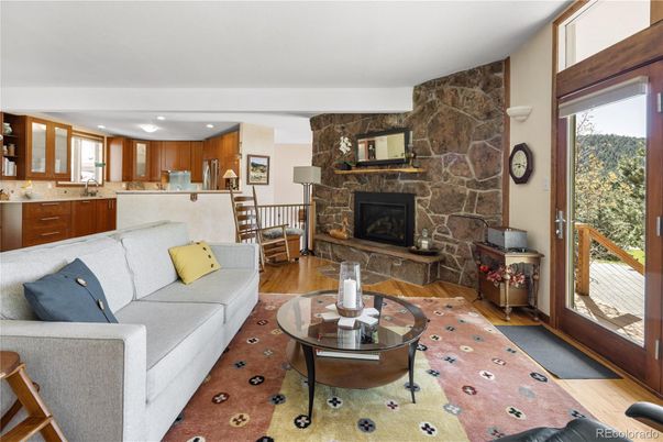 Fireplace, Interior, Kitchen, Living room, Recessed Lighting, Stone Walls, Wood Texture Flooring