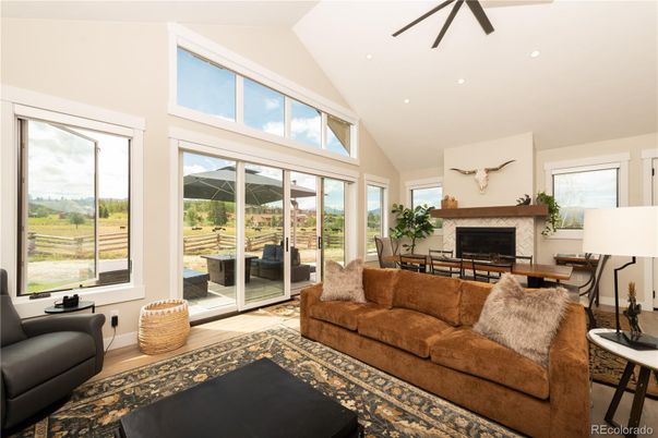 Dining room, Fireplace, Interior, Living room, Recessed Lighting, Sun Room, Wood Texture Flooring