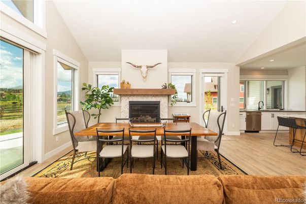 Dining room, Fireplace, Interior, Recessed Lighting, Wood Texture Flooring
