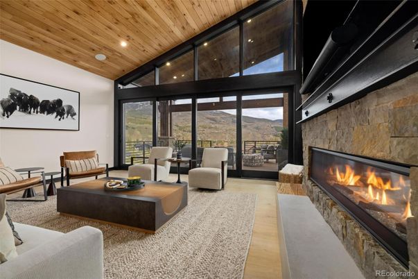 Fireplace, Interior, Living room, Recessed Lighting, Stone Walls, Wooden Ceilings, Wood Texture Flooring