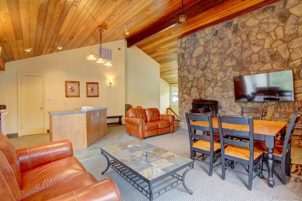 Dining room, Fireplace, Interior, Living room, Pendant Lights, Recessed Lighting, Stone Walls, Wooden Ceilings