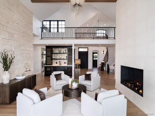 Fireplace, Interior, Living room, Recessed Lighting, Stone Walls, Wood Texture Flooring