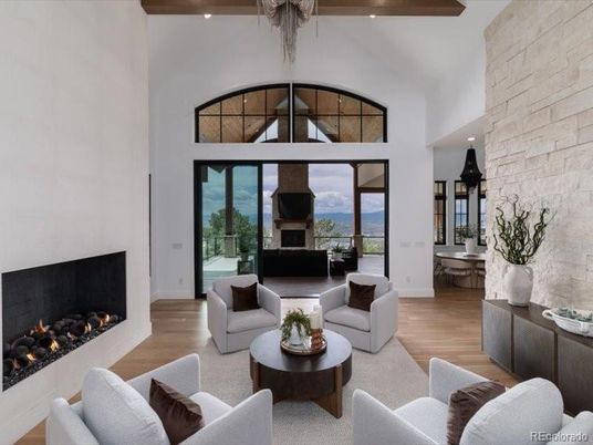 Fireplace, Interior, Living room, Recessed Lighting, Stone Walls, Water, Wooden Beams, Wood Texture Flooring