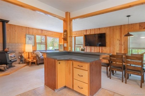 Dining room, Fireplace, Interior, Pendant Lights, Wooden Walls