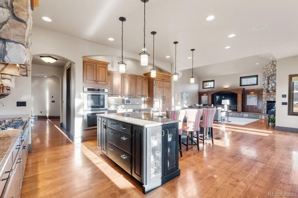 Fireplace, Interior, Kitchen, Pendant Lights, Recessed Lighting, Stainless Steel Appliances, Wood Texture Flooring