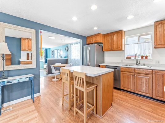 Dining room, Interior, Kitchen, Recessed Lighting, Stainless Steel Appliances, Wood Texture Flooring