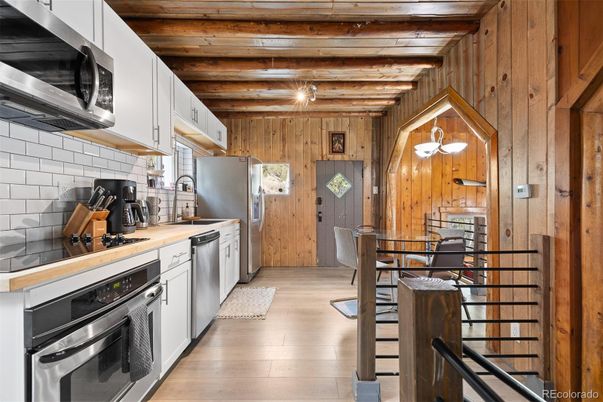 Dining room, Interior, Kitchen, Pendant Lights, Stainless Steel Appliances, Wooden Beams, Wooden Ceilings, Wood Texture Flooring, Wooden Walls