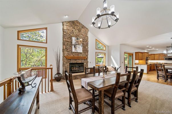Chandelier, Dining room, Fireplace, Interior, Kitchen, Pendant Lights, Recessed Lighting, Stone Walls, Wood Texture Flooring