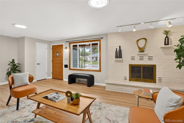 Fireplace, Interior, Living room, Recessed Lighting, Stone Walls, Wood Texture Flooring