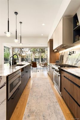 Dining room, Interior, Kitchen, Pendant Lights, Recessed Lighting, Stainless Steel Appliances, Wood Texture Flooring