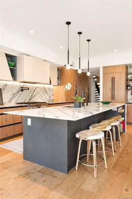 Interior, Kitchen, Marble Walls, Pendant Lights, Recessed Lighting, Wood Texture Flooring