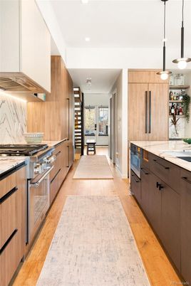 Interior, Kitchen, Marble Walls, Pendant Lights, Recessed Lighting, Wood Texture Flooring