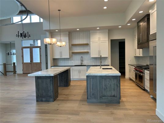 Chandelier, Interior, Kitchen, Pendant Lights, Recessed Lighting, Stainless Steel Appliances, Wood Texture Flooring