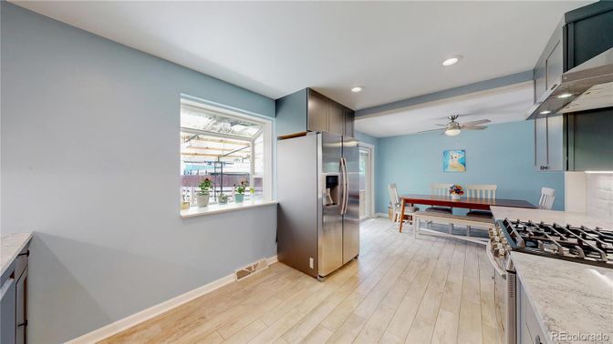 Dining room, Interior, Kitchen, Recessed Lighting, Stainless Steel Appliances, Wood Texture Flooring