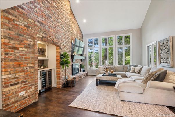 Fireplace, Interior, Living room, Recessed Lighting, Stone Walls, Wood Texture Flooring