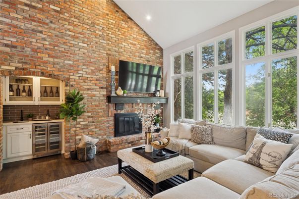 Fireplace, Interior, Living room, Recessed Lighting, Stone Walls, Wood Texture Flooring