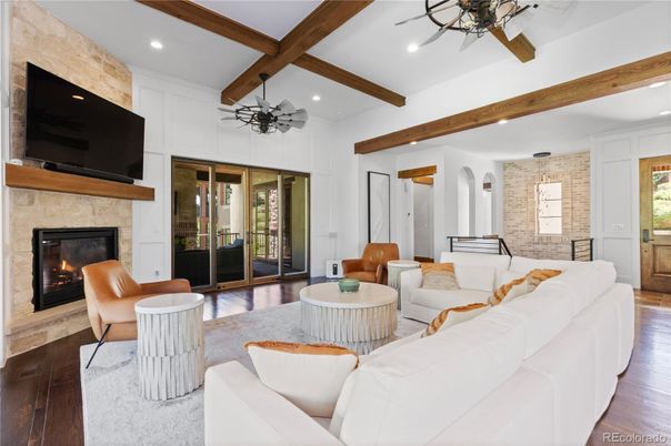 Fireplace, Interior, Living room, Pendant Lights, Recessed Lighting, Stone Walls, Wooden Beams, Wood Texture Flooring