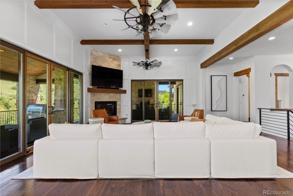 Fireplace, Interior, Living room, Recessed Lighting, Wooden Beams, Wood Texture Flooring