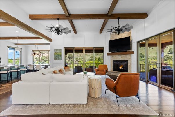 Dining room, Fireplace, Interior, Living room, Pendant Lights, Recessed Lighting, Wooden Beams, Wood Texture Flooring