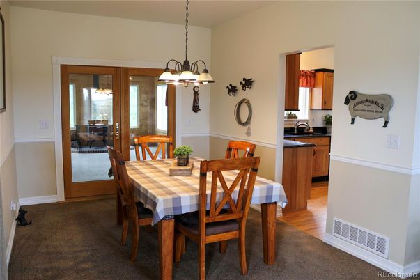 Chandelier, Dining room, Interior, Pendant Lights, Wood Texture Flooring