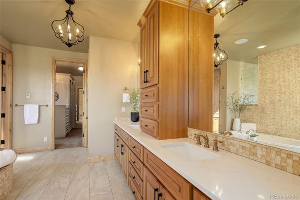 Bathroom, Chandelier, Dual Sink Vanities, Interior, Marble, Pendant Lights, Recessed Lighting