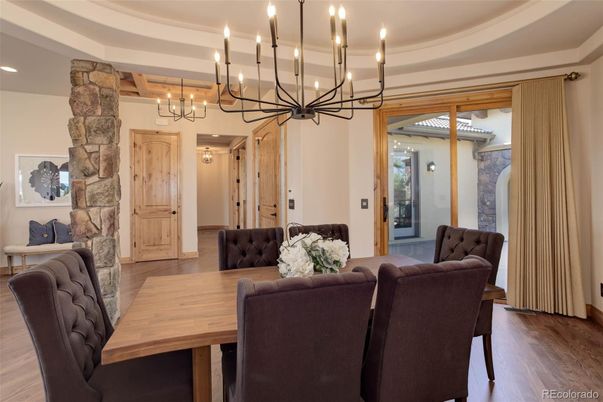 Chandelier, Dining room, Interior, Recessed Lighting, Stone Walls, Wood Texture Flooring