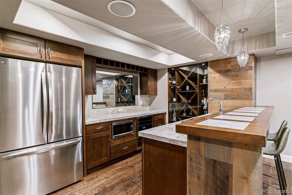 Interior, Kitchen, Pendant Lights, Stainless Steel Appliances, Wood Texture Flooring, Wooden Walls