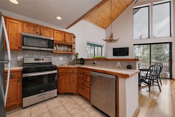 Dining room, Interior, Kitchen, Recessed Lighting, Stainless Steel Appliances, Wooden Ceilings, Wood Texture Flooring