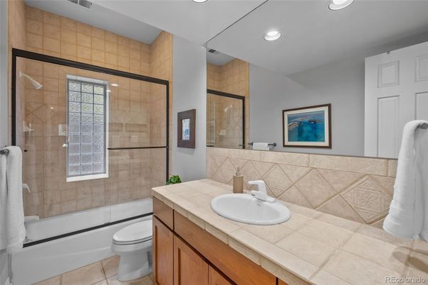Bathroom, Glass Shower, Interior, Recessed Lighting, Tile Countertops