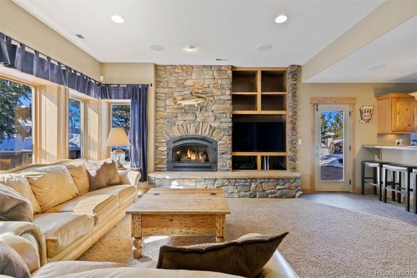 Fireplace, Interior, Living room, Recessed Lighting, Stone Walls