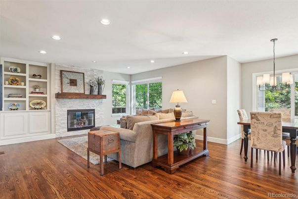 Dining room, Fireplace, Interior, Living room, Pendant Lights, Recessed Lighting, Stone Walls, Wood Texture Flooring