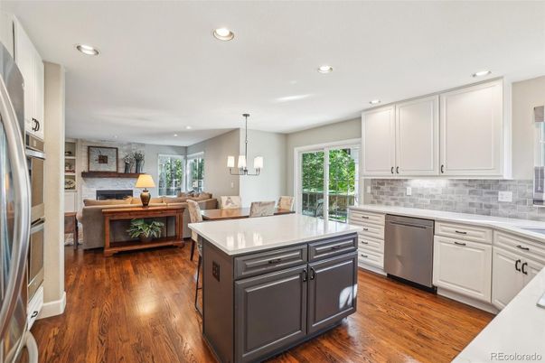 Chandelier, Dining room, Interior, Kitchen, Living room, Recessed Lighting, Stainless Steel Appliances, Wood Texture Flooring