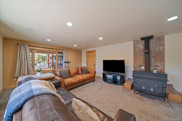 Fireplace, Interior, Living room, Recessed Lighting, Stone Walls