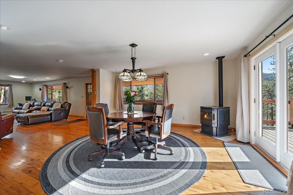 Dining room, Fireplace, Interior, Living room, Pendant Lights, Recessed Lighting, Wood Texture Flooring