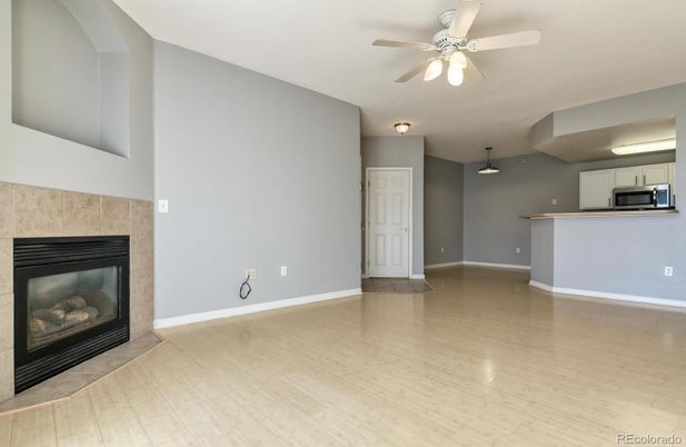 Empty room, Fireplace, Interior, Kitchen, Pendant Lights, Wood Texture Flooring