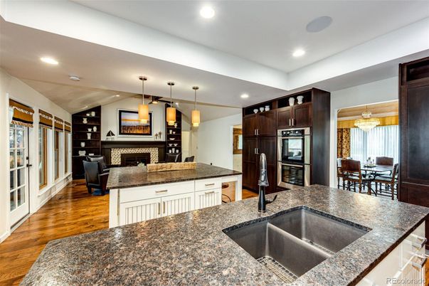 Chandelier, Dining room, Fireplace, Interior, Kitchen, Pendant Lights, Recessed Lighting, Wood Texture Flooring