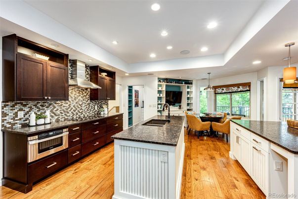 Dining room, Interior, Kitchen, Pendant Lights, Recessed Lighting, Stainless Steel Appliances, Wood Texture Flooring