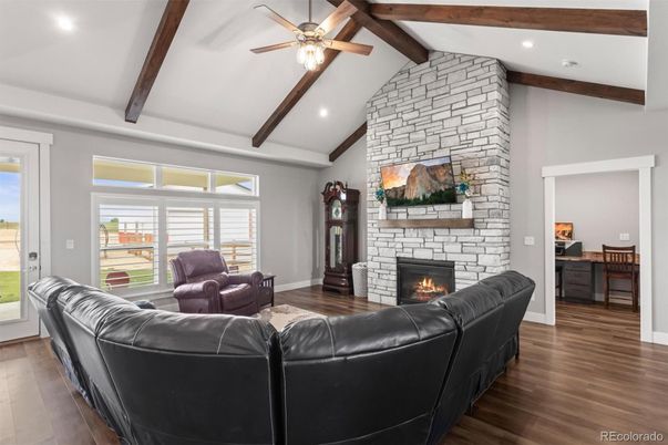 Fireplace, Interior, Living room, Recessed Lighting, Stone Walls, Wooden Beams, Wood Texture Flooring