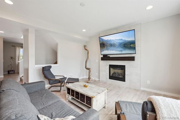 Fireplace, Interior, Living room, Recessed Lighting, Wood Texture Flooring