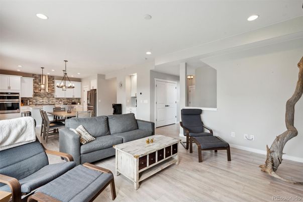 Dining room, Interior, Kitchen, Living room, Pendant Lights, Recessed Lighting, Stainless Steel Appliances, Wood Texture Flooring