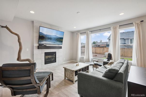 Fireplace, Interior, Living room, Recessed Lighting, Wood Texture Flooring