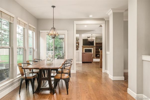 Chandelier, Dining room, Fireplace, Interior, Pendant Lights, Recessed Lighting, Wood Texture Flooring
