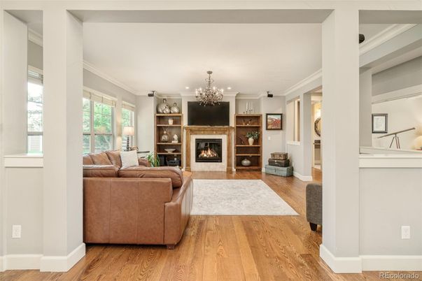 Chandelier, Fireplace, Interior, Living room, Recessed Lighting, Wood Texture Flooring