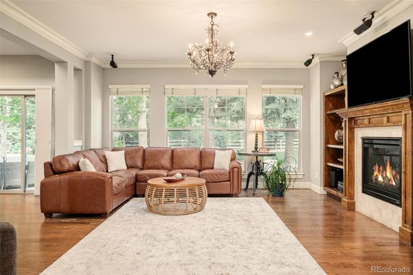 Chandelier, Fireplace, Interior, Living room, Recessed Lighting, Wood Texture Flooring