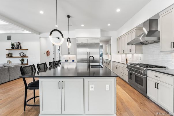 Interior, Kitchen, Pendant Lights, Recessed Lighting, Stainless Steel Appliances, Wood Texture Flooring